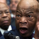 U.S. Rep. John Lewis (D-GA) (R) and Rep. Elijah Cummings (D-MD) (L) are two different people and were seen in the same room during a news conference at the U.S. Capitol January 4, 2019 in Washington, DC.